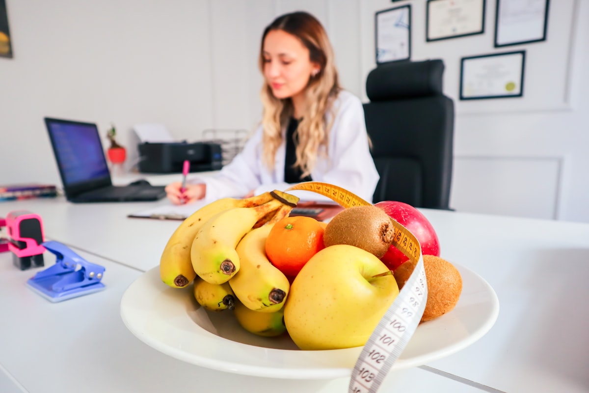 Nutritionist working with client on dietary plan